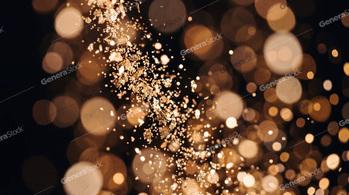 Abstract Golden Glitter and Bokeh Background with Shimmering Gold Flakes