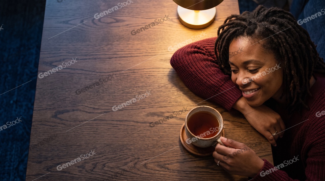 High angle view of a relaxed smiling African American woman with