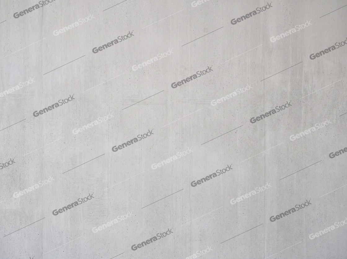 Light grey concrete wall texture background with subtle vertical streaks and industrial finish
