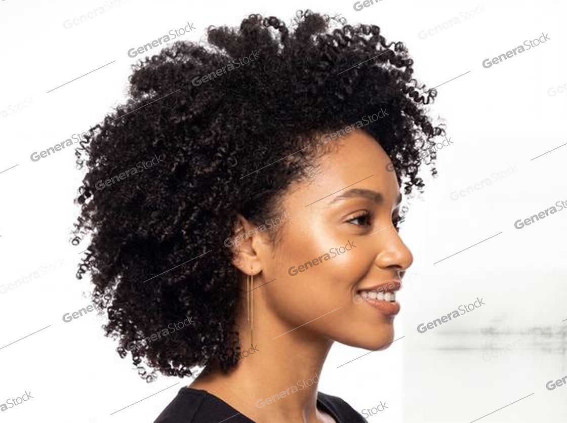 woman with natural curls in profile, clean white background, studio light