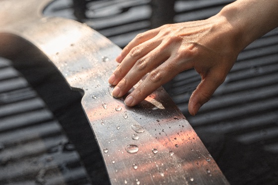 close, view, hand, touching, smooth, wet, surface, covered, close-up, shot, person, gently, dark, with, clear, water, droplets, the, warm, sunlight, catches, moisture, creating, bright, reflections, and, highlighting, texture, both, skin, touch, droplet, finger, light, drop, detail, macro, human, feeling, tactile, sensory, reflection, shine, outdoor, wood, body, dew, splash, fresh, liquid, concept, calm, peace, gentle, care, reach, finger-tip, metal, condensation, sunshine, relaxation, wellness, natural, background, brightness, backgrounds, textures