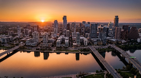aerial, view, the, austin, texas, downtown, skyline, sunset, featu, high-angle, shot, captures, sprawling, sun, sets, golden, light, reflects, off, calm, waters, lady, bird, lake, highlighting, modern, skyscrapers, and, city, bridges, colorado, river, hour, urban, landscape, reflection, bridge, water, dusk, evening, travel, tourism, architecture, buildings, usa, america, scenic, horizon, orange, yellow, cityscape, panorama, capital, south, central, park, riverfront, traffic, road, highway, infrastructure, outdoors, sky, vibrant, beautiful, landmark, congress, avenue, first, street