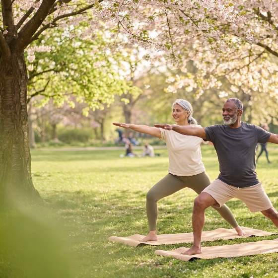 senior, man, and, woman, performing, the, warrior, yoga, pose, mats, sunny, park, with, pink, cherry, blossoms, diverse, couple, focusing, fitness, wellness, health, during, their, retirement, exercise, active, blossom, spring, outdoor, meditation, stretching, lifestyle, multiracial, elderly, nature, blooming, sakura, tree, sunshine, morning, peaceful, calm, training, workout, mat, athletic, sportswear, vitality, wellbeing, harmony, balance, leisure, recreation, hobby, time, garden, greenery, physical, activity, mental, togetherness, partnership, people