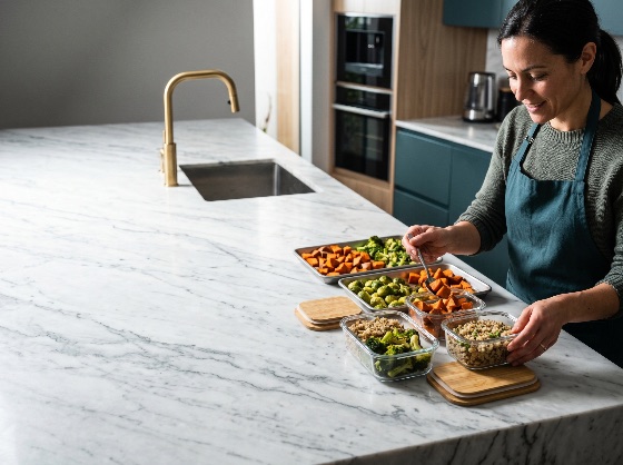 woman, preparing, healthy, meal, prep, containers, with, roasted, vegetables, modern, kitchen, eating, nutrition, cooking, sweet, potato, broccoli, brussels, sprouts, organization, lifestyle, home, planning, glass, food, storage, wellness, marble, countertop, diet, vegetarian, vegan, homemade, fresh, organic, domestic, life, female, apron, portion, control, fitness, health, drink