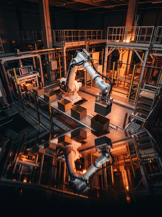 industrial, robotic, arm, picking, cardboard, boxes, conveyor, belt, modern, automated, warehouse, with, warm, lighting, and, floor, reflection, automation, logistics, factory, smart, technology, industry, box, packaging, manufacturing, mechanical, engineering, efficiency, distribution, supply, chain, shipping, sorting, production, line, high-tech, equipment, interior, construction