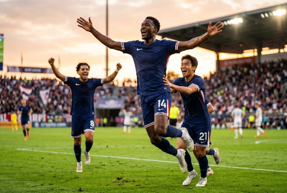 excited, professional, soccer, players, blue, uniforms, celebrating, winning, goal, with, arms, raised, packed, stadium, during, sunset, match, football, celebration, victory, team, sport, athlete, joy, excitement, competition, cheering, teammate, grass, field, pitch, uniform, jersey, crowd, fans, happiness, success, scoring, game, action, male, men, diverse, emotion, triumph, athletic, outdoor, summer, evening, golden, hour, championship, tournament, league, sportsmanship, energy, dynamic, sports, fitness