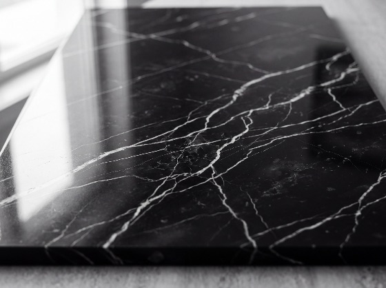 luxurious, polished, black, marble, slab, with, elegant, white, veining, and, reflective, surface, texture, stone, background, luxury, natural, pattern, glossy, interior, design, material, dark, mineral, granite, countertop, architecture, reflection, modern, tile, floor, wall, decor, nero, marquina, abstract, close-up, detail, construction, home, kitchen, bathroom, backgrounds, textures
