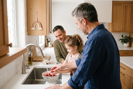 happy, same-sex, male, couple, with, their, young, daughter, washing, fresh, strawberries, modern, kitchen, family, gay, fathers, parents, child, fruit, healthy, food, domestic, home, lifestyle, bonding, love, together, interior, men, girl, childhood, parenting, lgbt, lgbtq, diversity, inclusion, happiness, smiling, preparation, snack, organic, cleaning, sink, faucet, colander, morning, breakfast, togetherness, caucasian, people, three, group