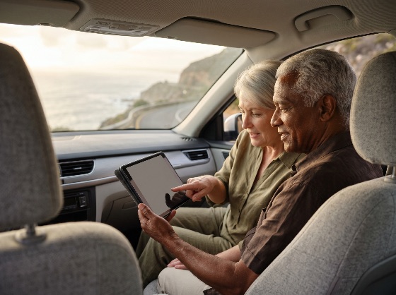 happy, senior, interracial, couple, using, digital, tablet, while, traveling, car, scenic, coastal, road, trip, travel, elderly, retirement, navigation, technology, vacation, lifestyle, journey, planning, device, man, woman, mature, together, adventure, driving, tourism, leisure, ocean, view, outdoors, vehicle, communication, connection, diverse, togetherness, map, gps, exploration, active, seniors, holiday, seaside, cliff, people